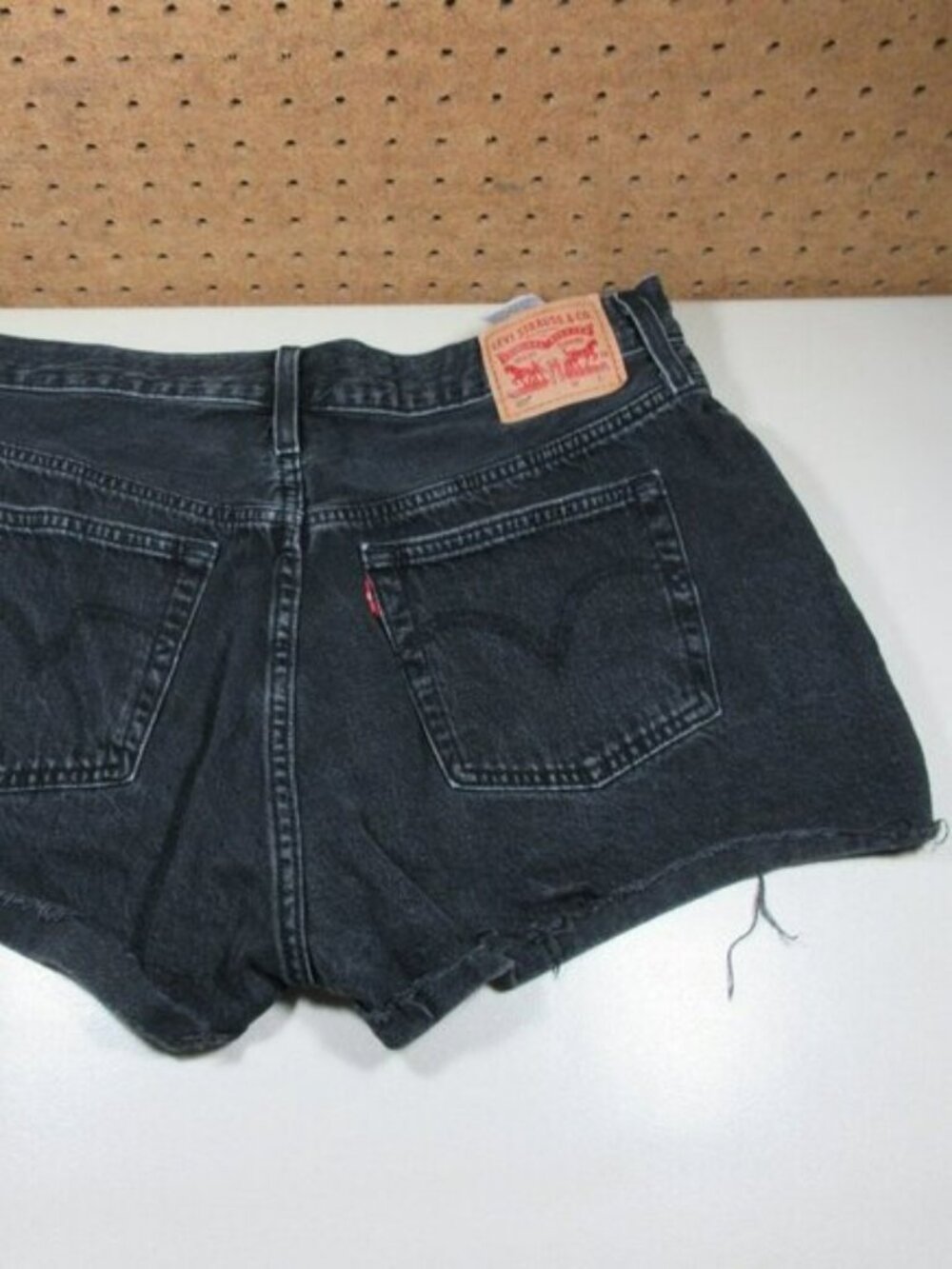Levis womens dark gray distressed buttonfly jean shorts 33